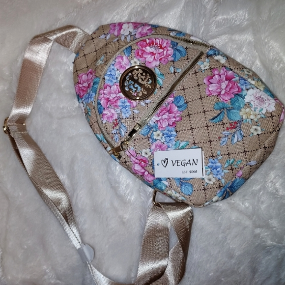 Guess Handbags - NWT floral tan crossbody bumbag